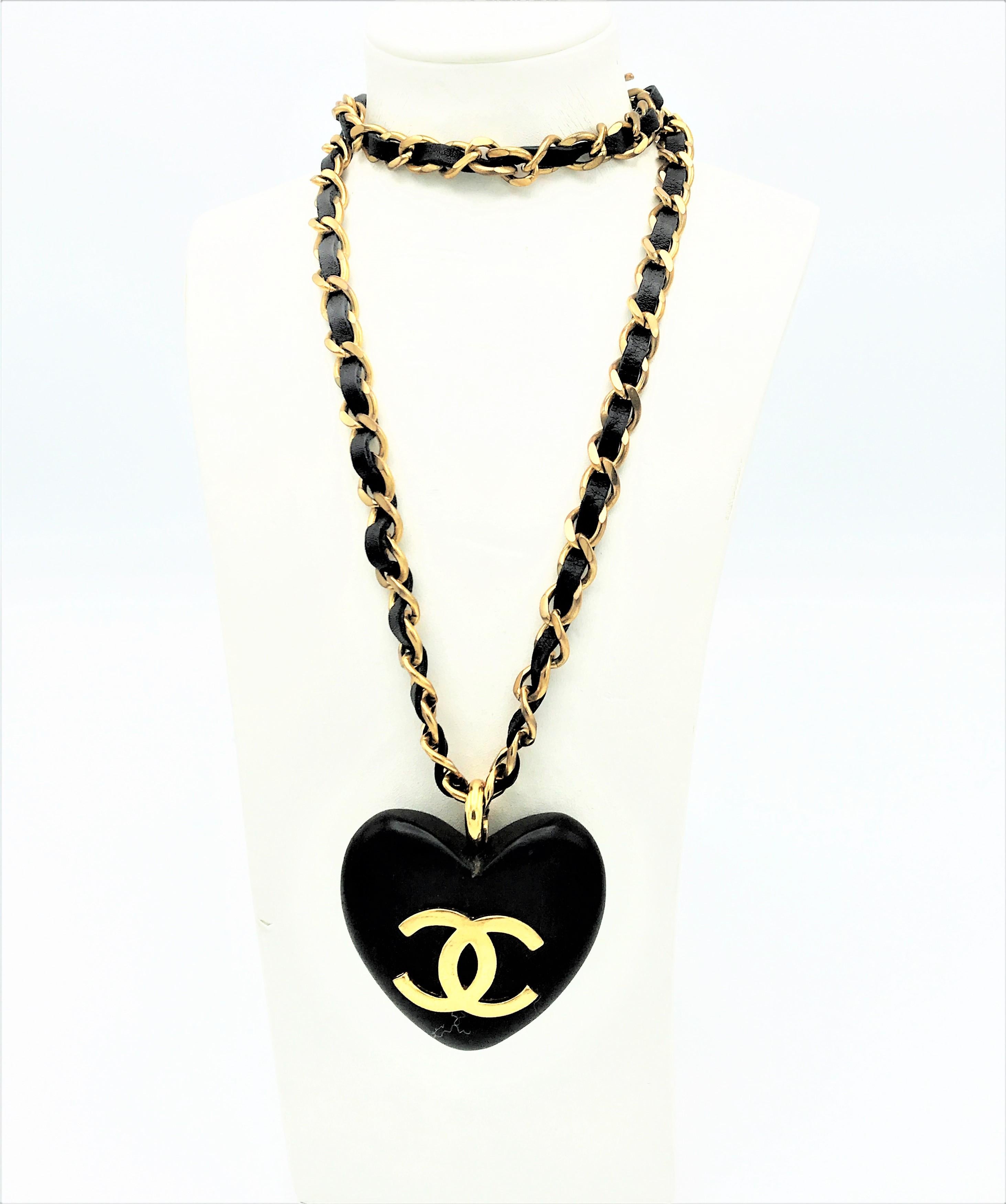 Modern An Ebony Heart hangs on the iconic Chanel chain with leather sign. 1990 