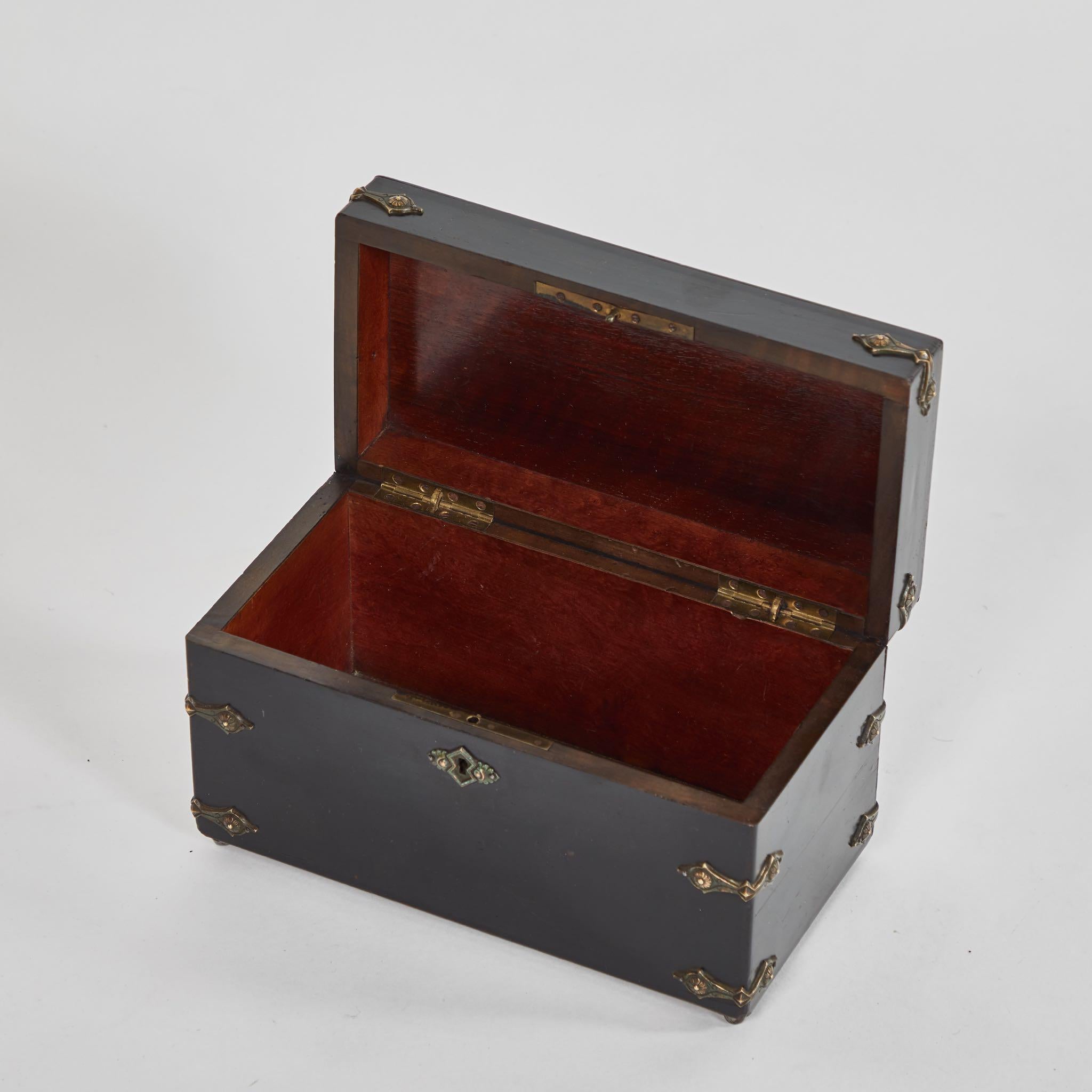An ebonized and decorated box, originating in France, circa 1830.