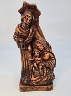 An ecclesiastical Italian carved olive wood figure group, circa 1880