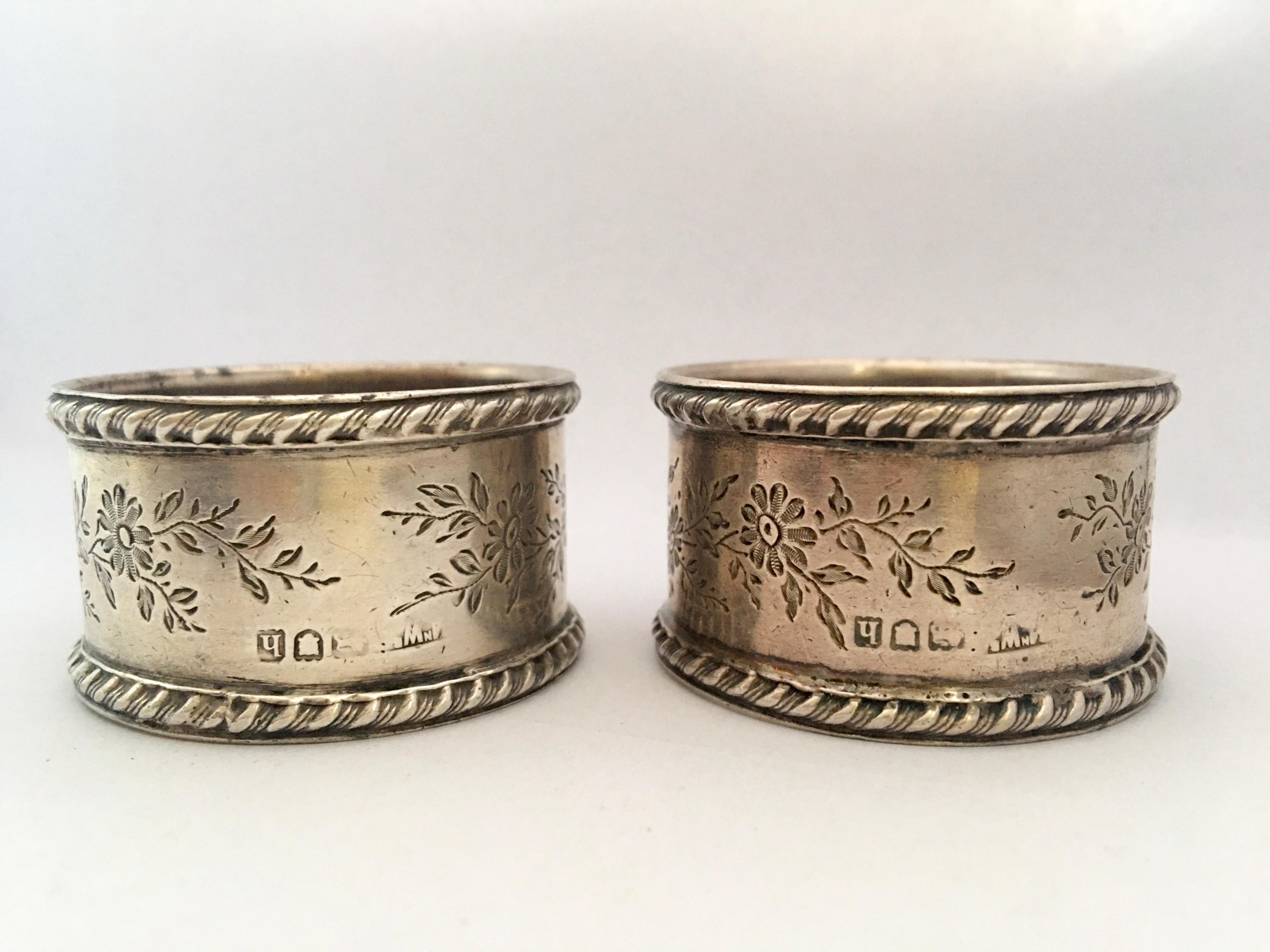 This beautiful pair of antique solid silver napkins rings has aged and wear but still remain is good shape used condition. Without a box Please study the images carefully as form part of the description.