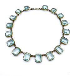 An Edwardian aquamarine faceted glass riviere necklace, French, c1900.