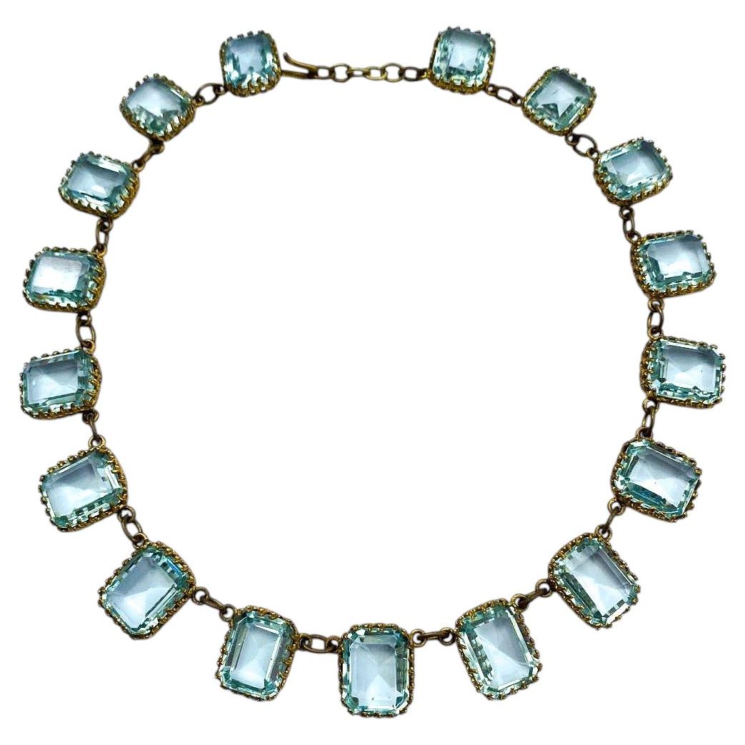 An Edwardian aquamarine faceted glass riviere necklace, French, c1900.