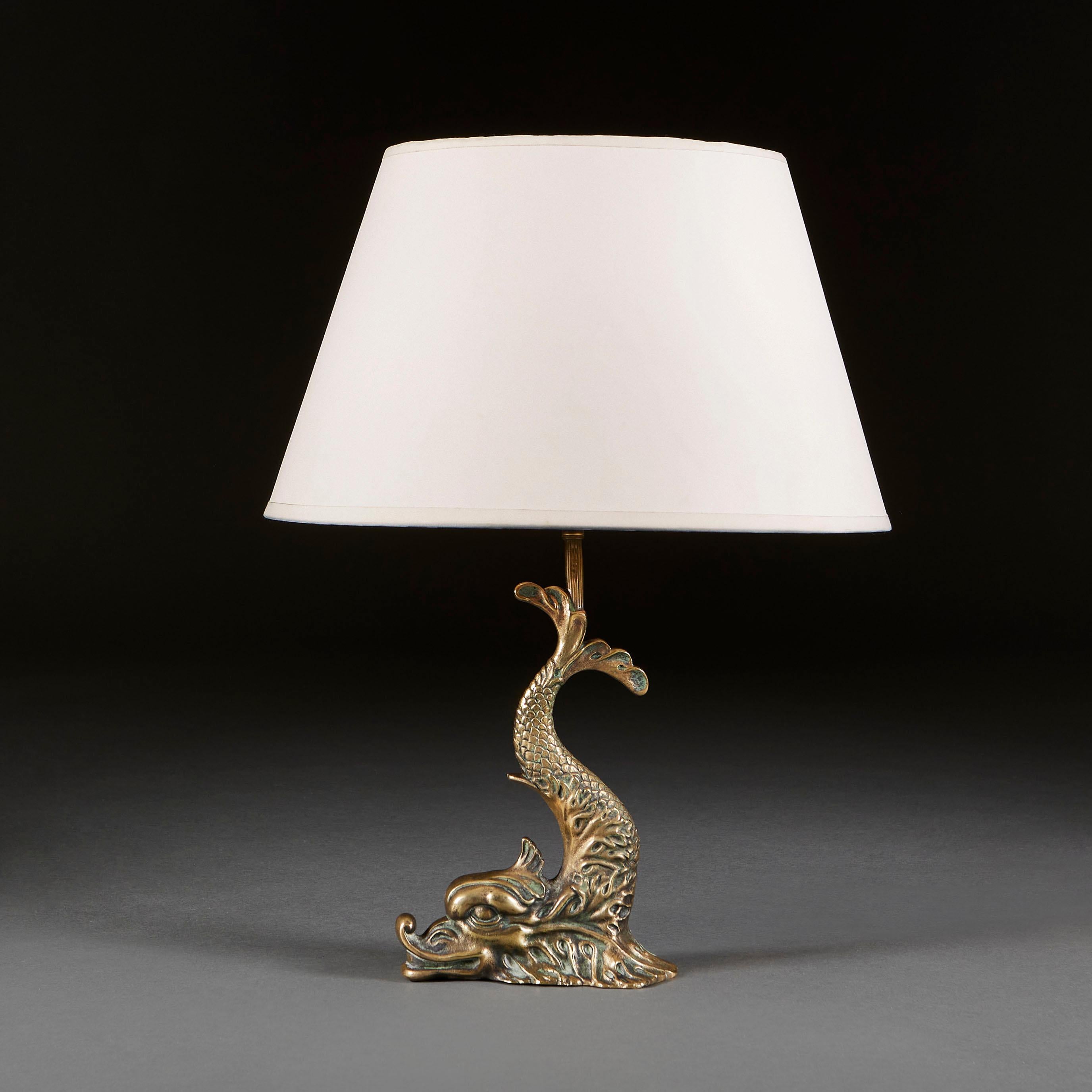 English An Edwardian Brass Dolphin Table Lamp For Sale