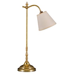 An Edwardian Brass Student Lamp With Articulated Arm