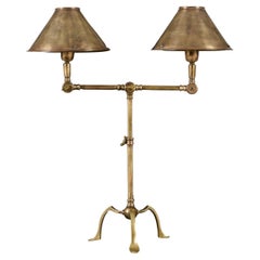 An Edwardian Brass Twin Arm Articulated Desk Lamp