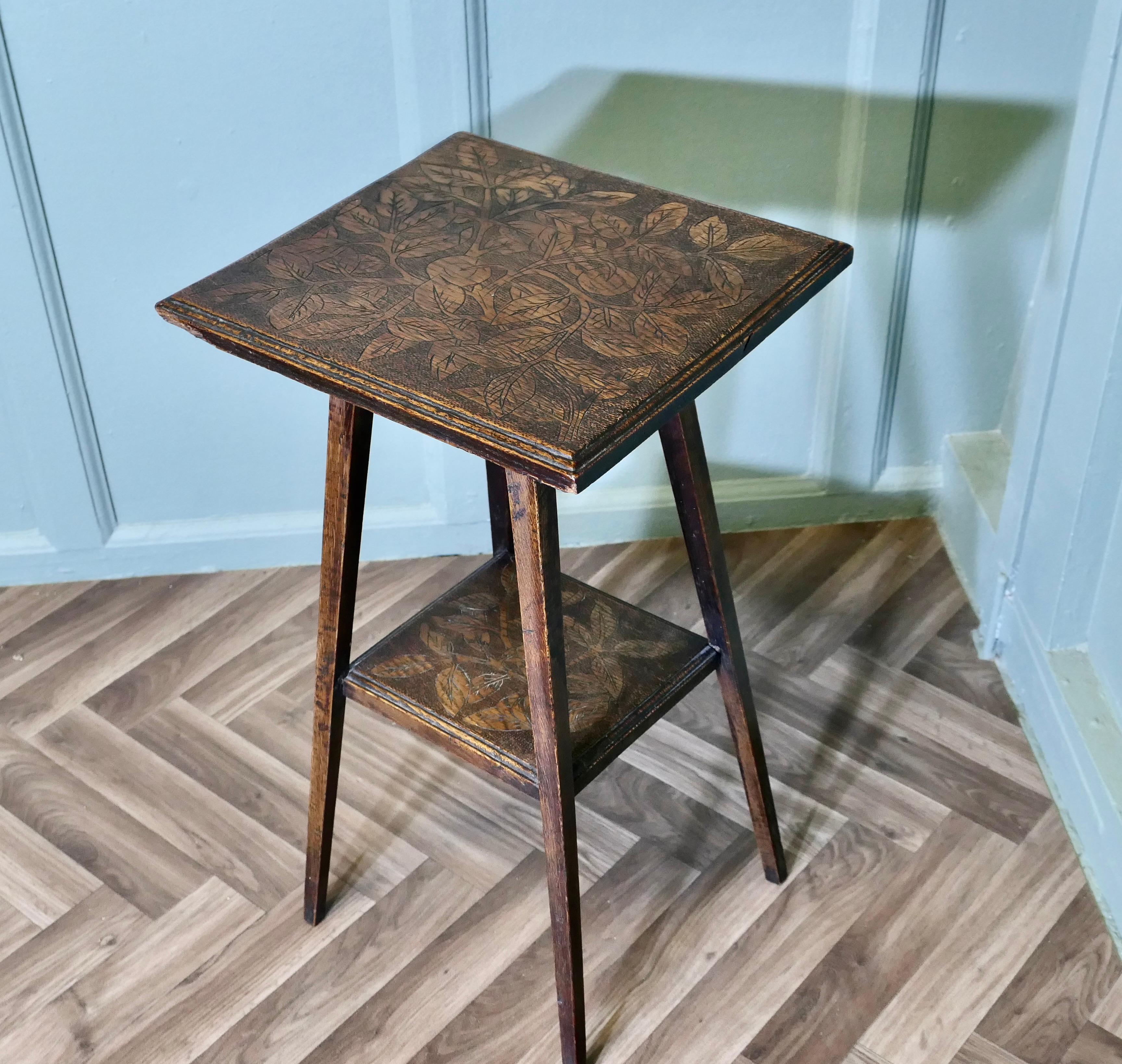 Arts and Crafts An Edwardian Carved Oak Etagere or Occasional Table For Sale