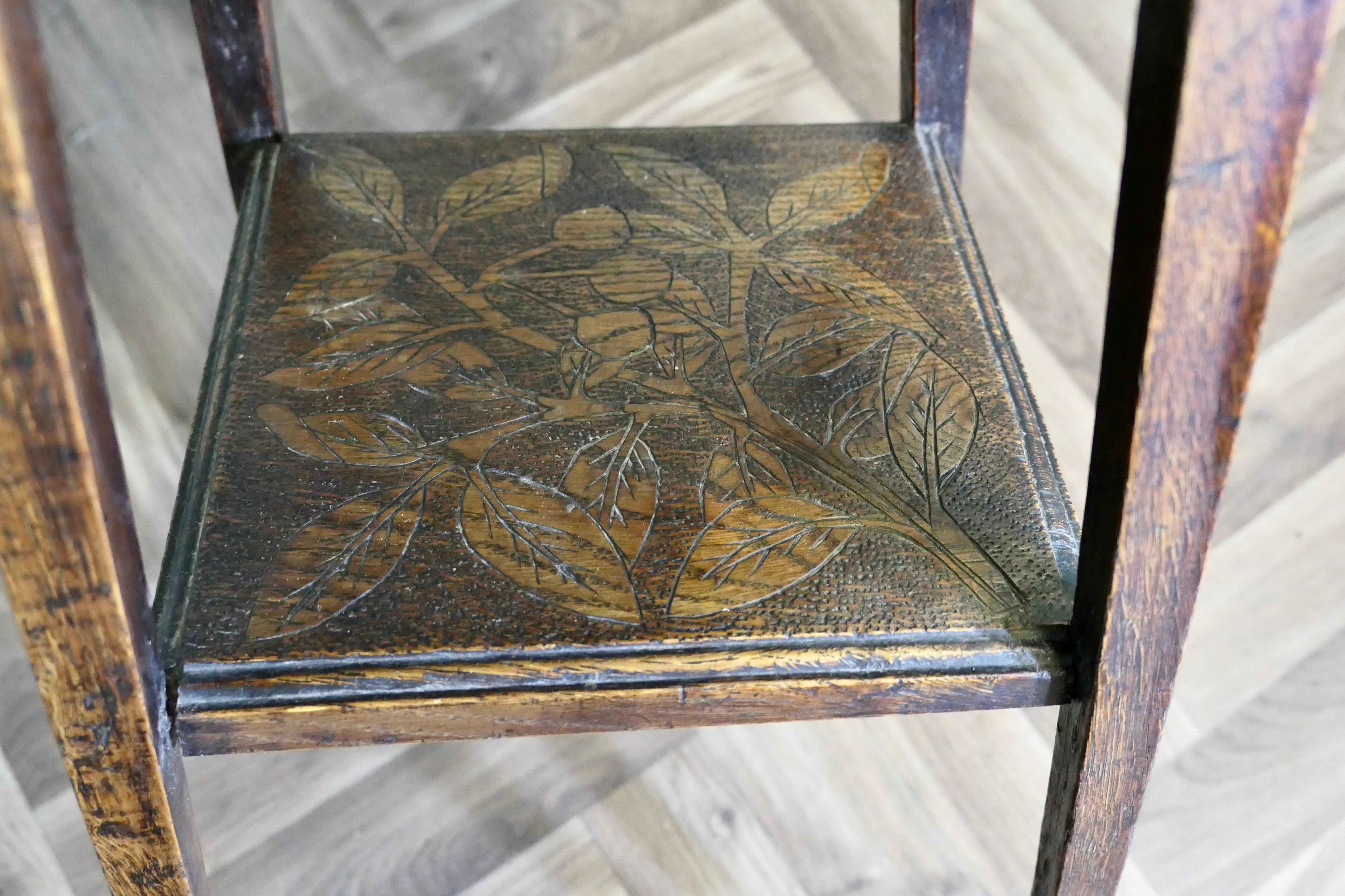 Early 20th Century An Edwardian Carved Oak Etagere or Occasional Table For Sale