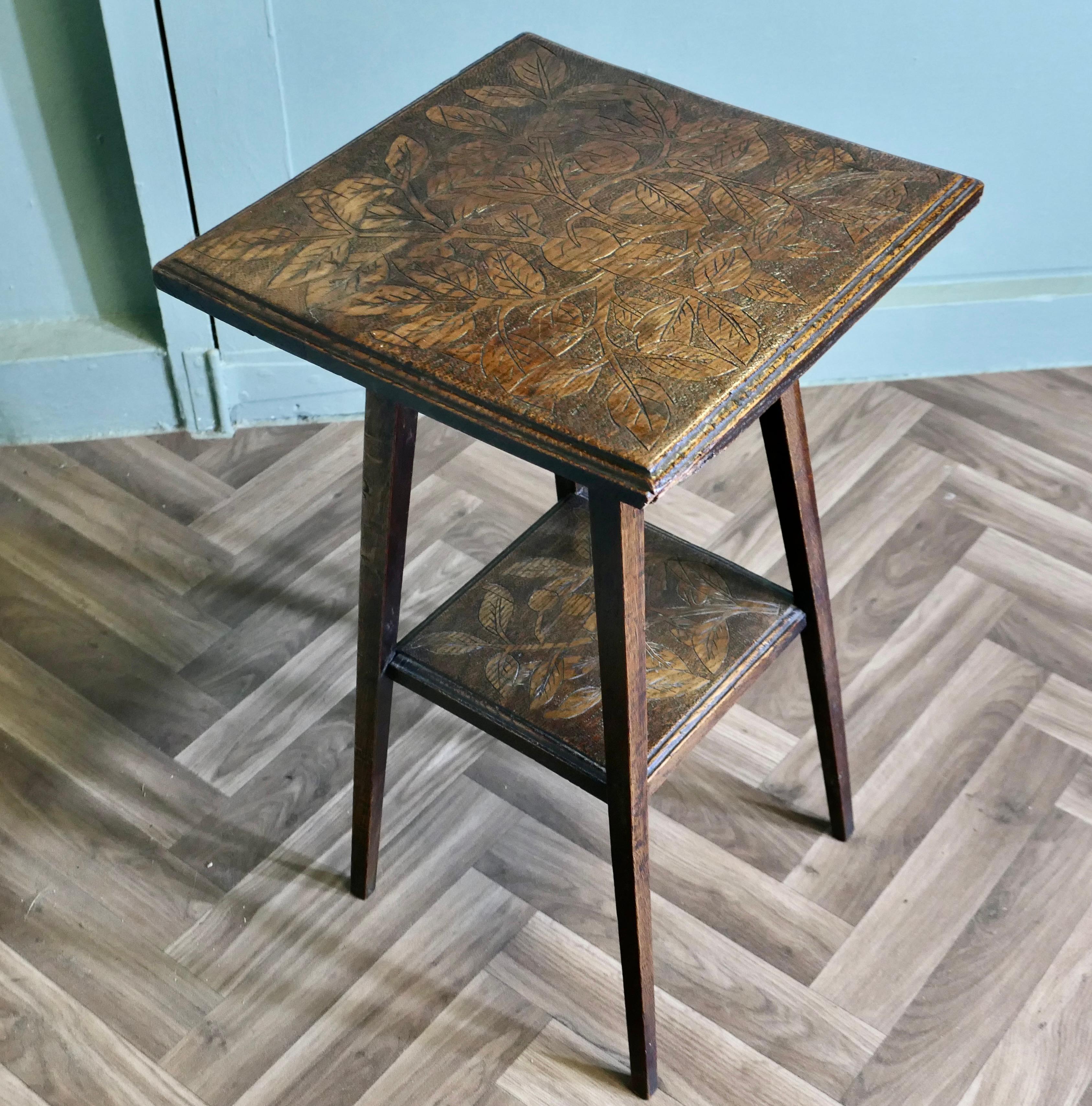 An Edwardian Carved Oak Etagere or Occasional Table For Sale 1