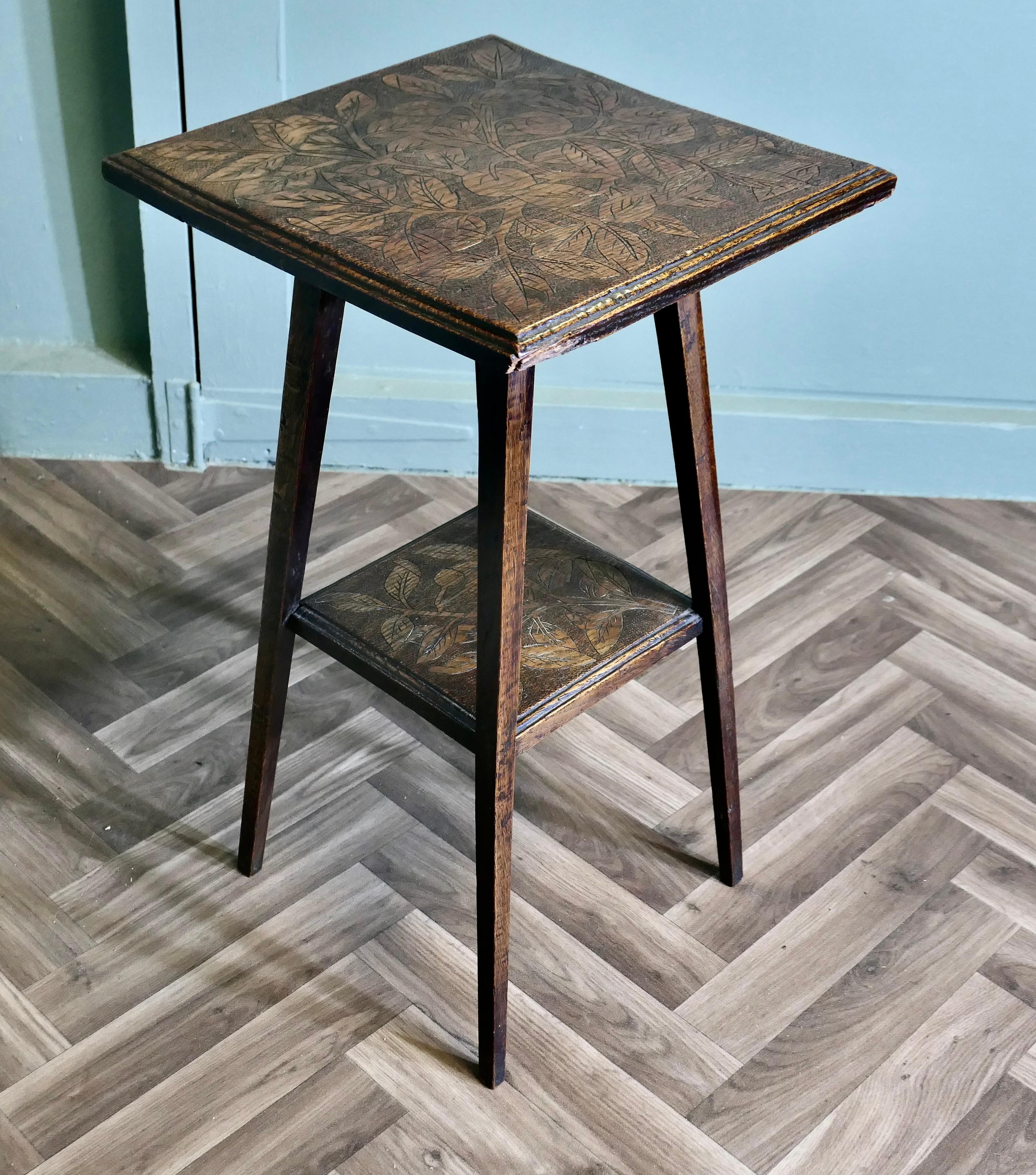 An Edwardian Carved Oak Etagere or Occasional Table For Sale 2