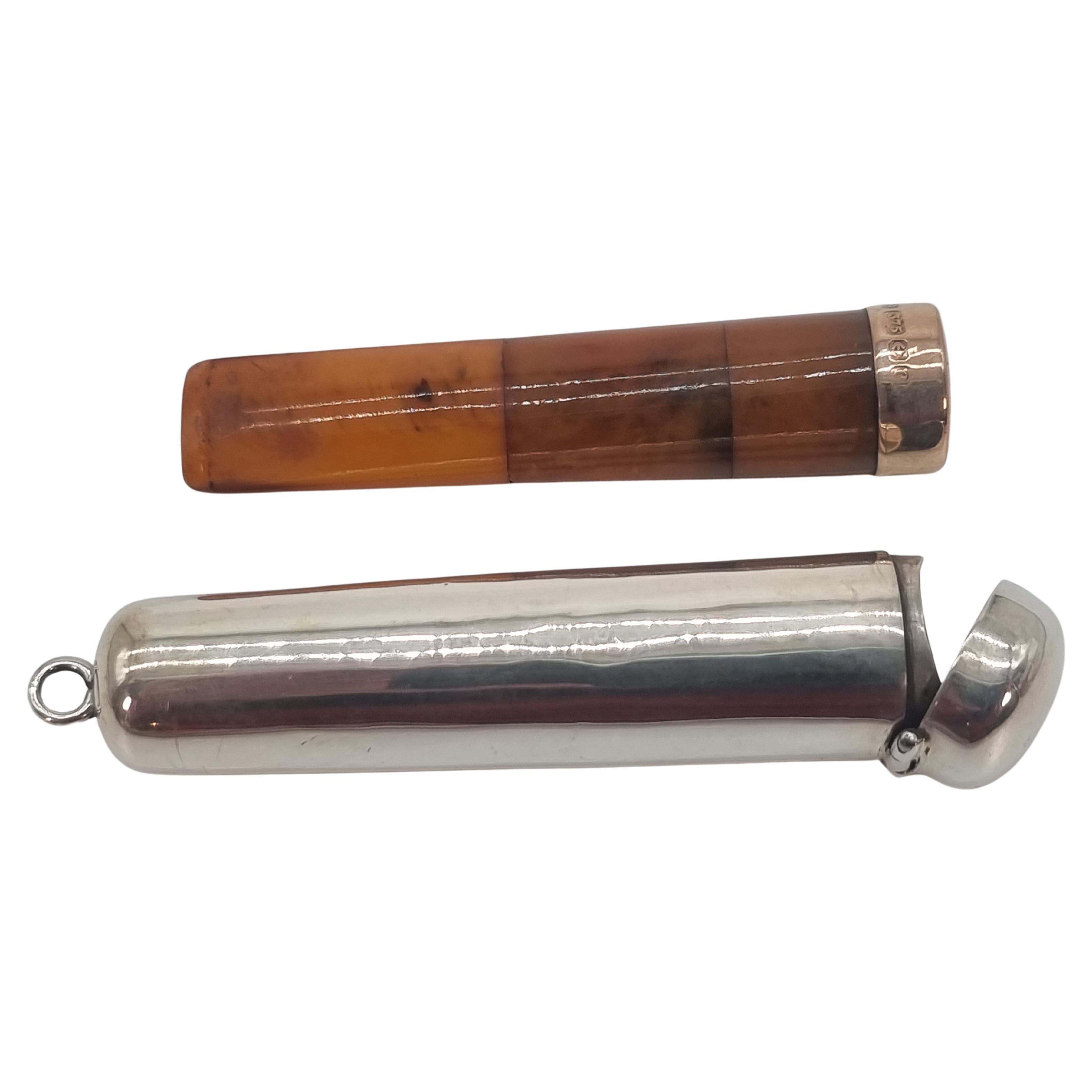 An Edwardian cheroot holder and case made from silver amber and gold 1902 - 3
