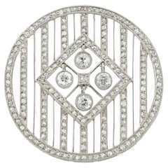 An Edwardian circular diamond brooch-pendant