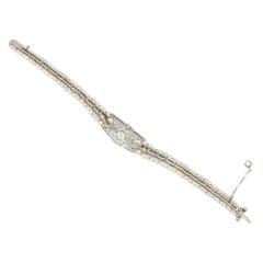 An Edwardian diamond and pearl bracelet