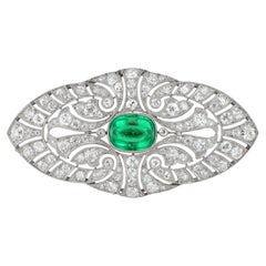 An Edwardian emerald and diamond brooch