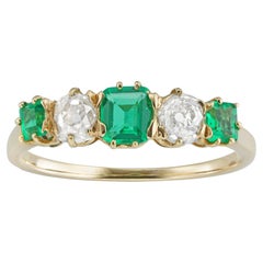 Vintage An Edwardian emerald and diamond five-stone ring