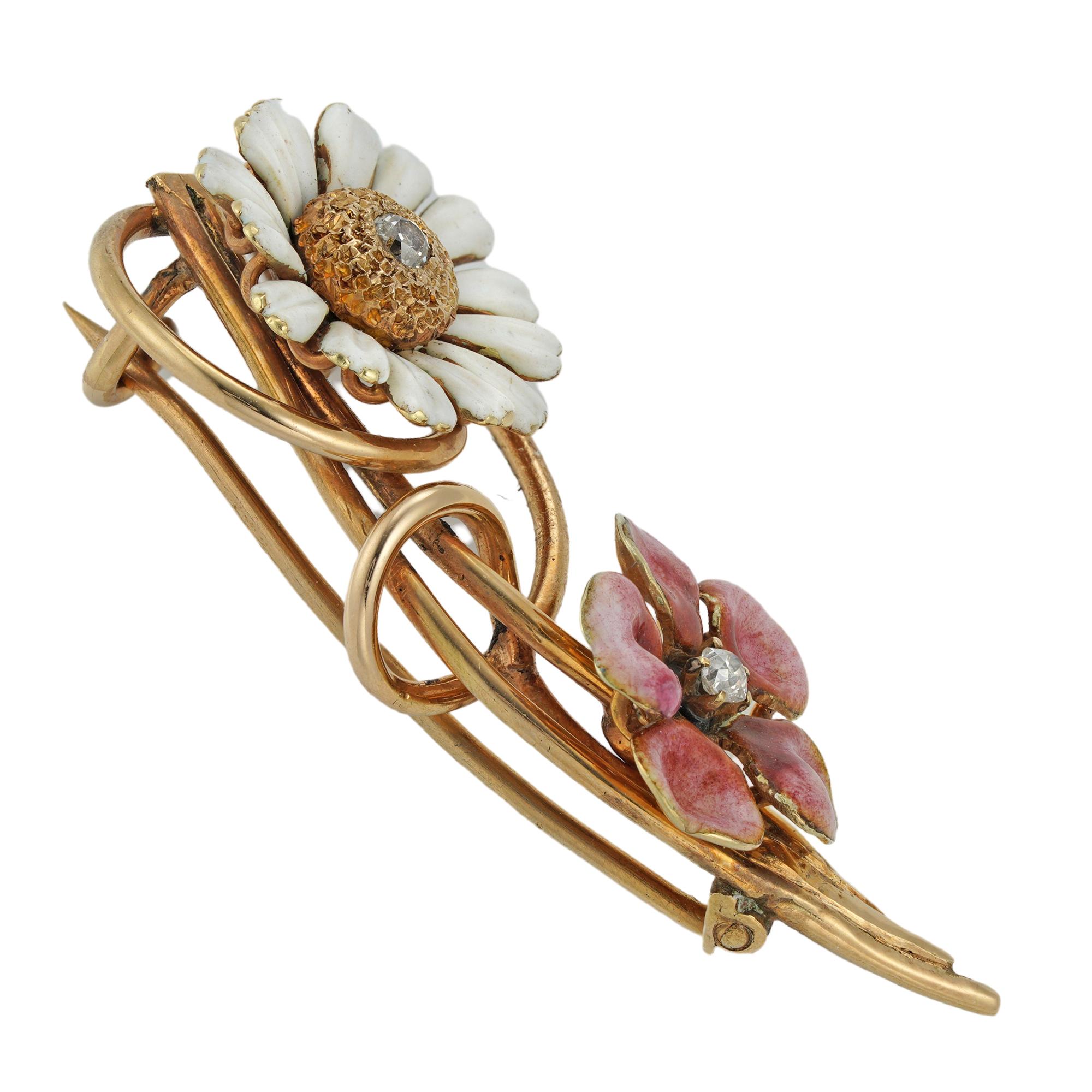 An Edwardian enamel flower brooch, in the form of a spray with a finely enamelled  English Daisy and a Virginia Rose, each centrally-set with an old European-cut diamond estimated to weigh 0.1 carats in total, entwined with gold tendril decorations,