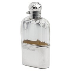 An Edwardian Era Mappin & Webb Sterling Silver and Glass Hip Flask