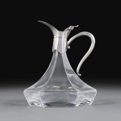 An Edwardian Hexagonal Silver and Glass Claret Jug