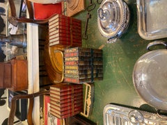 An Edwardian Huntley & Palmers Lithographed Book Form Biscuit Tin, Center One So