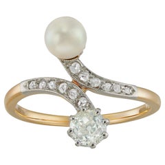 Bague croisée édouardienne en perles naturelles et diamants