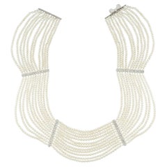 An Edwardian Natural Pearl And Diamond Festoon Necklace