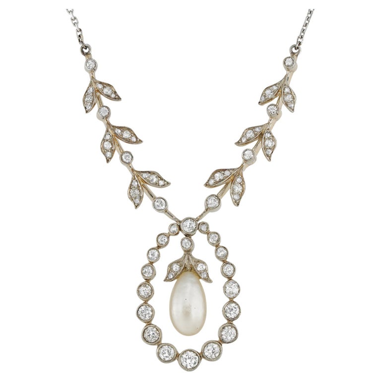 An Edwardian natural pearl and diamond necklace