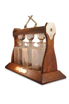 Late Victorian Oak Decanter Tantalus With Three Cut Glass Decanters