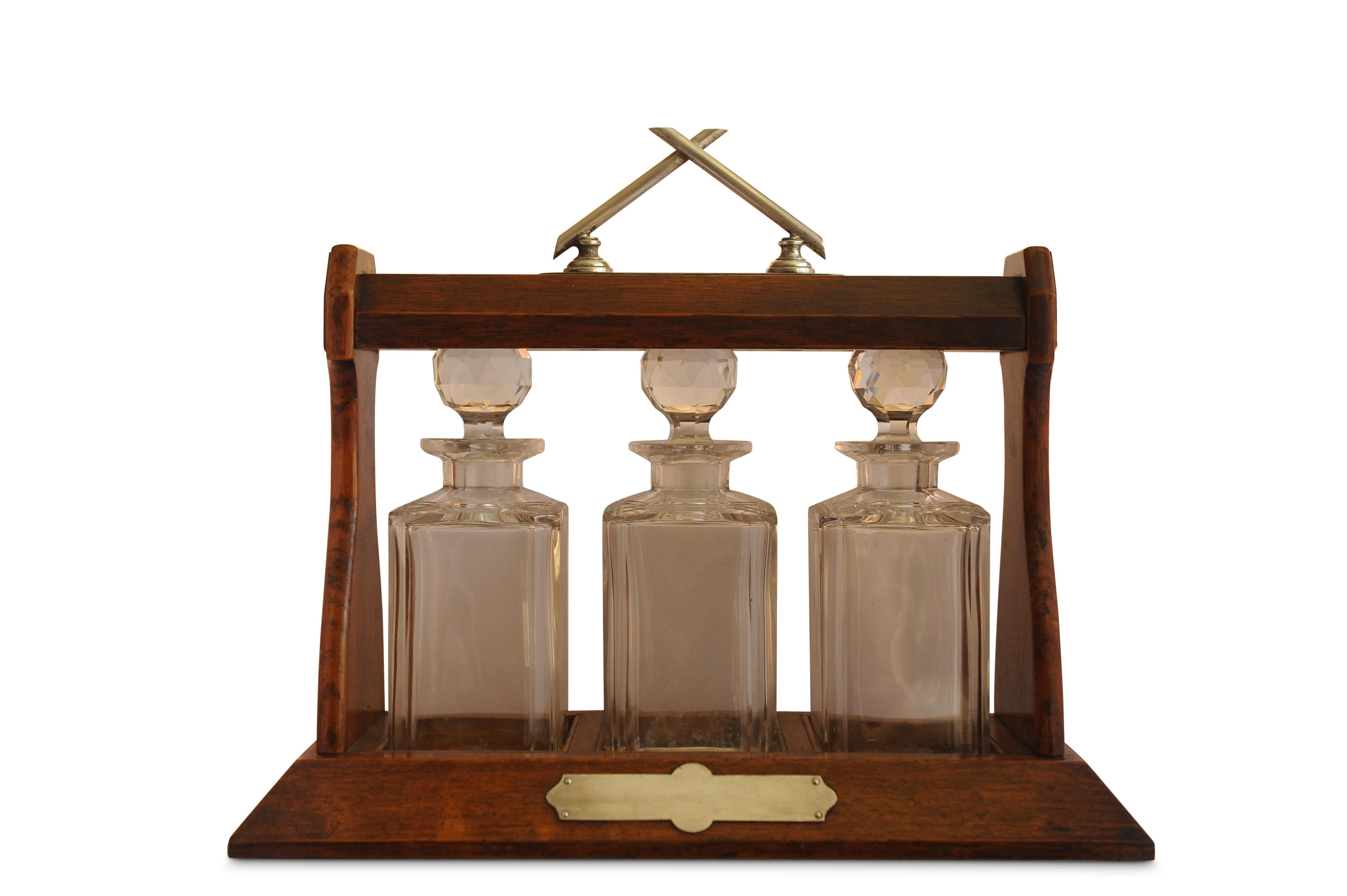 20th Century Late Victorian Oak Decanter Tantalus With Three Cut Glass Decanters