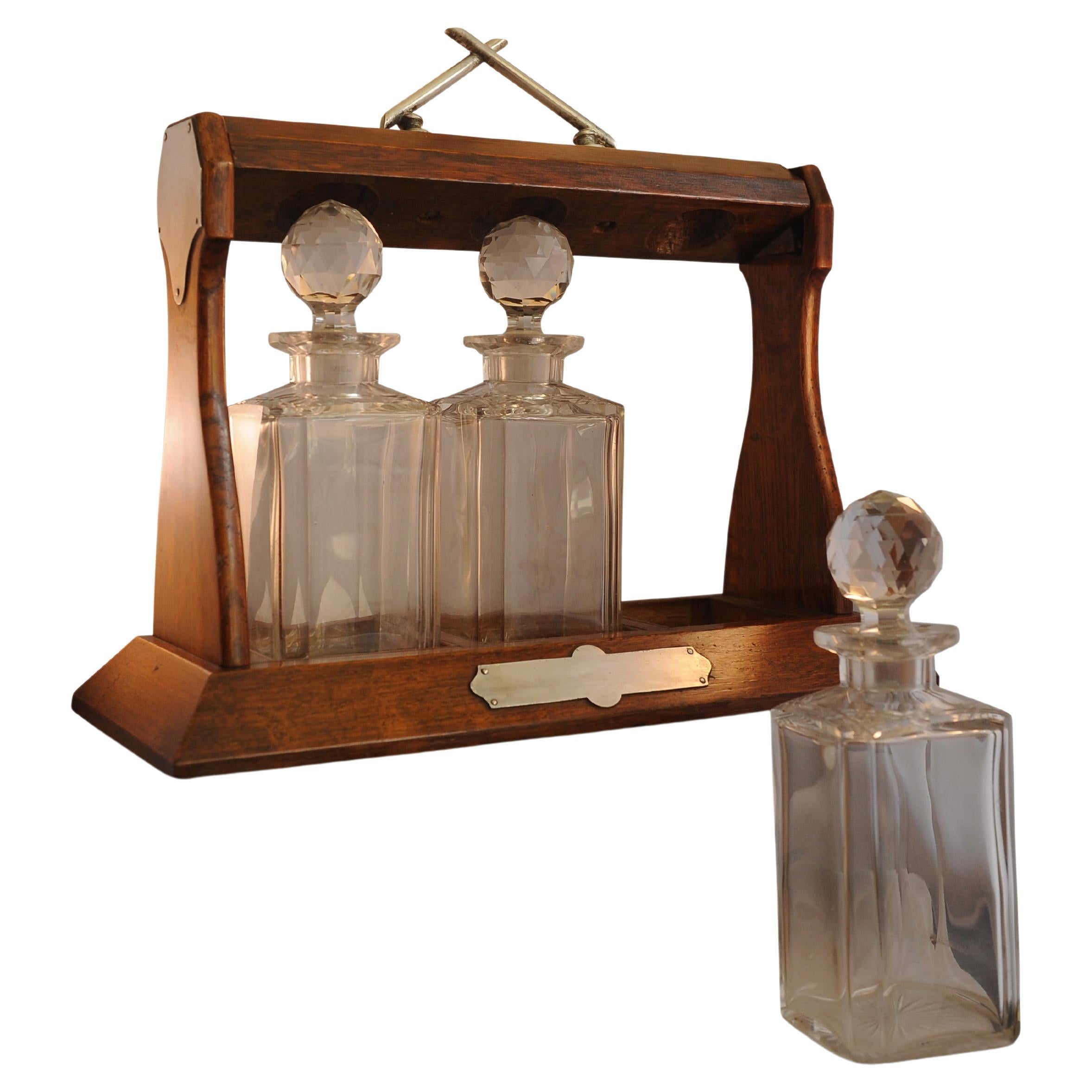 Late Victorian Oak Decanter Tantalus With Three Cut Glass Decanters