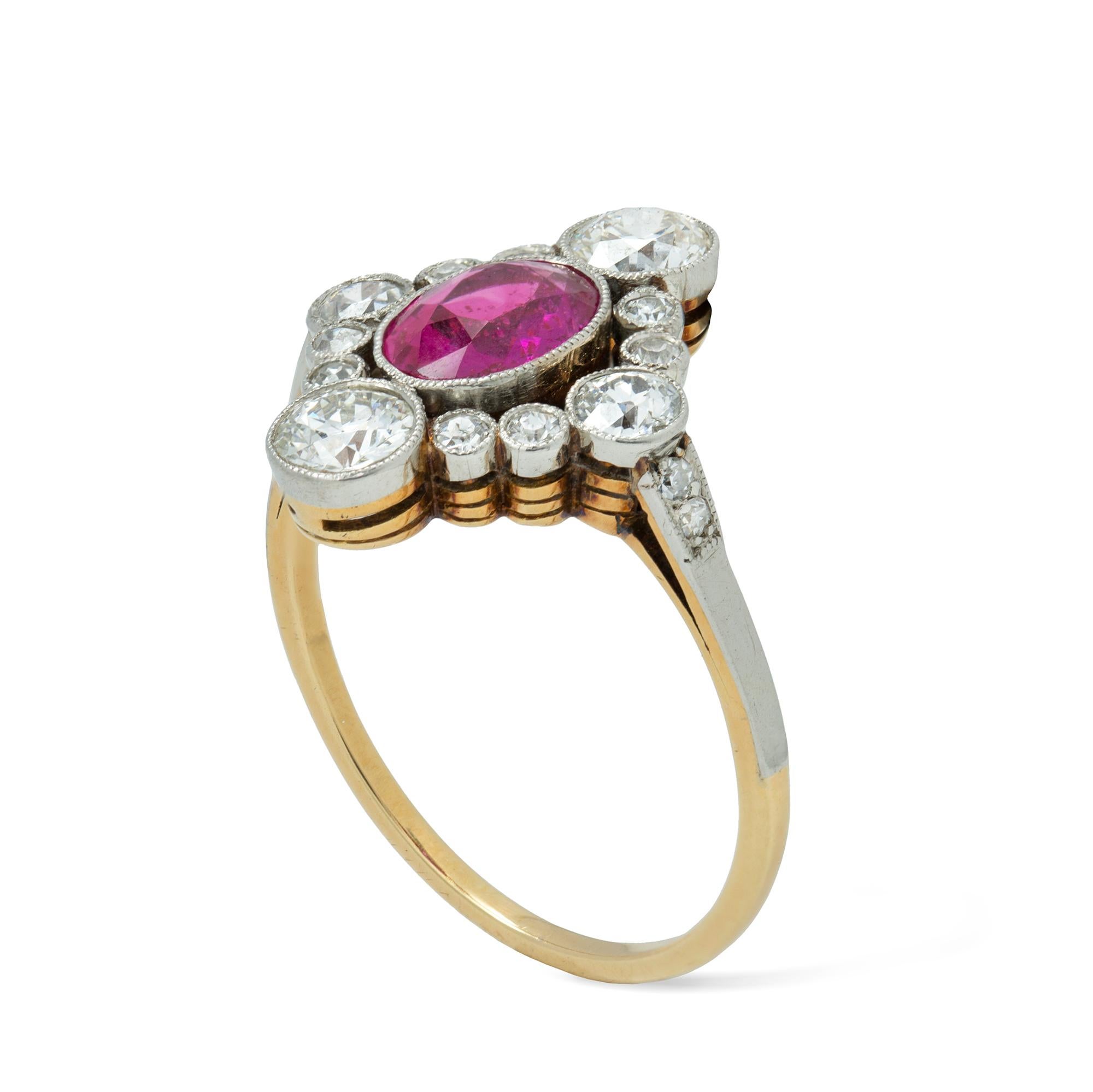 An Edwardian ruby and diamond cluster ring, the oval-cut ruby with estimated weight of 1 carat, accompanied by GCS Report stating to be of Burmese origin with no indication of heating, vertically set between two old brilliant-cut diamonds each