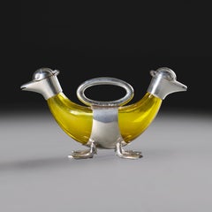 An Edwardian Silver and Yellow Glass Twin Headed Duck Cruet Set