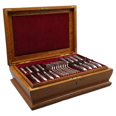 An Edwardian silver cutlery canteen by Holland, Aldwinckle and Slater