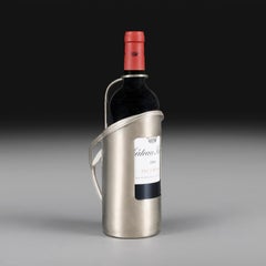 An Edwardian Silver Plated Wine Bottle Carrier