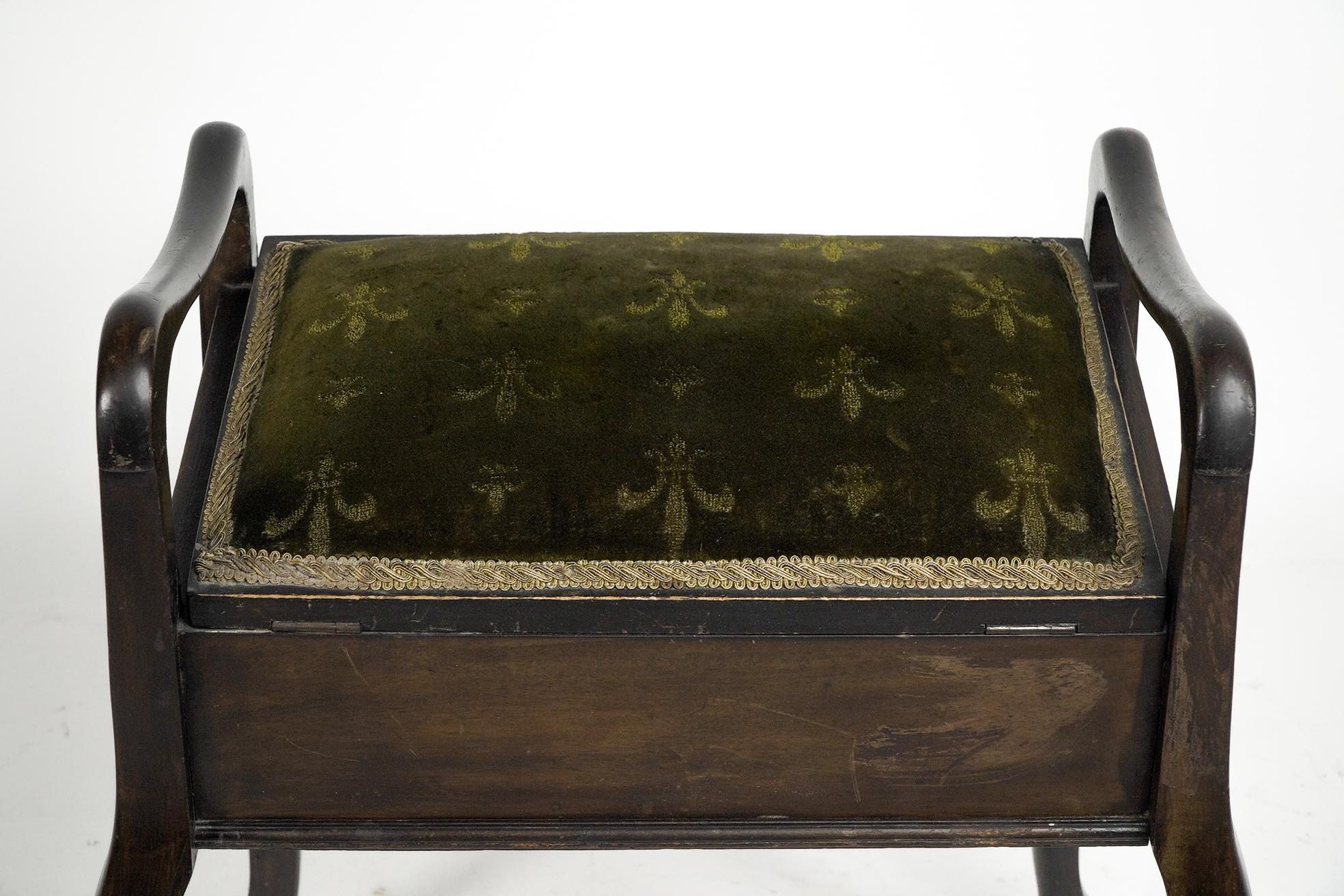 An Edwardian stained Beech piano stool with period green fleur de lys fabric. 4