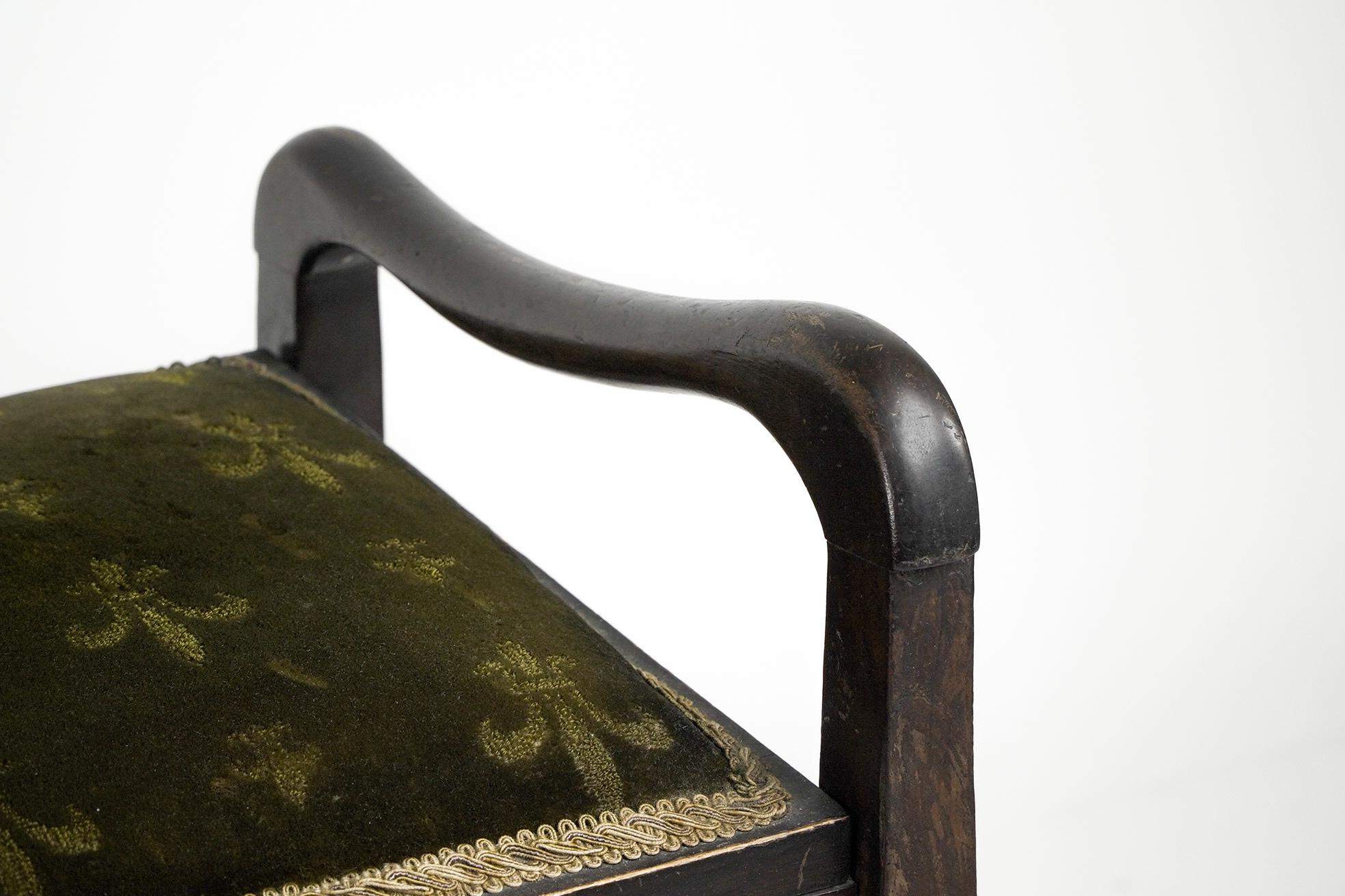 An Edwardian stained Beech piano stool with period green fleur de lys fabric. 5