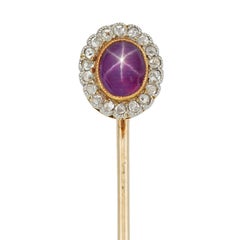 Anstecknadel mit edwardianischem Stern-Rubin- und Diamant-Cluster