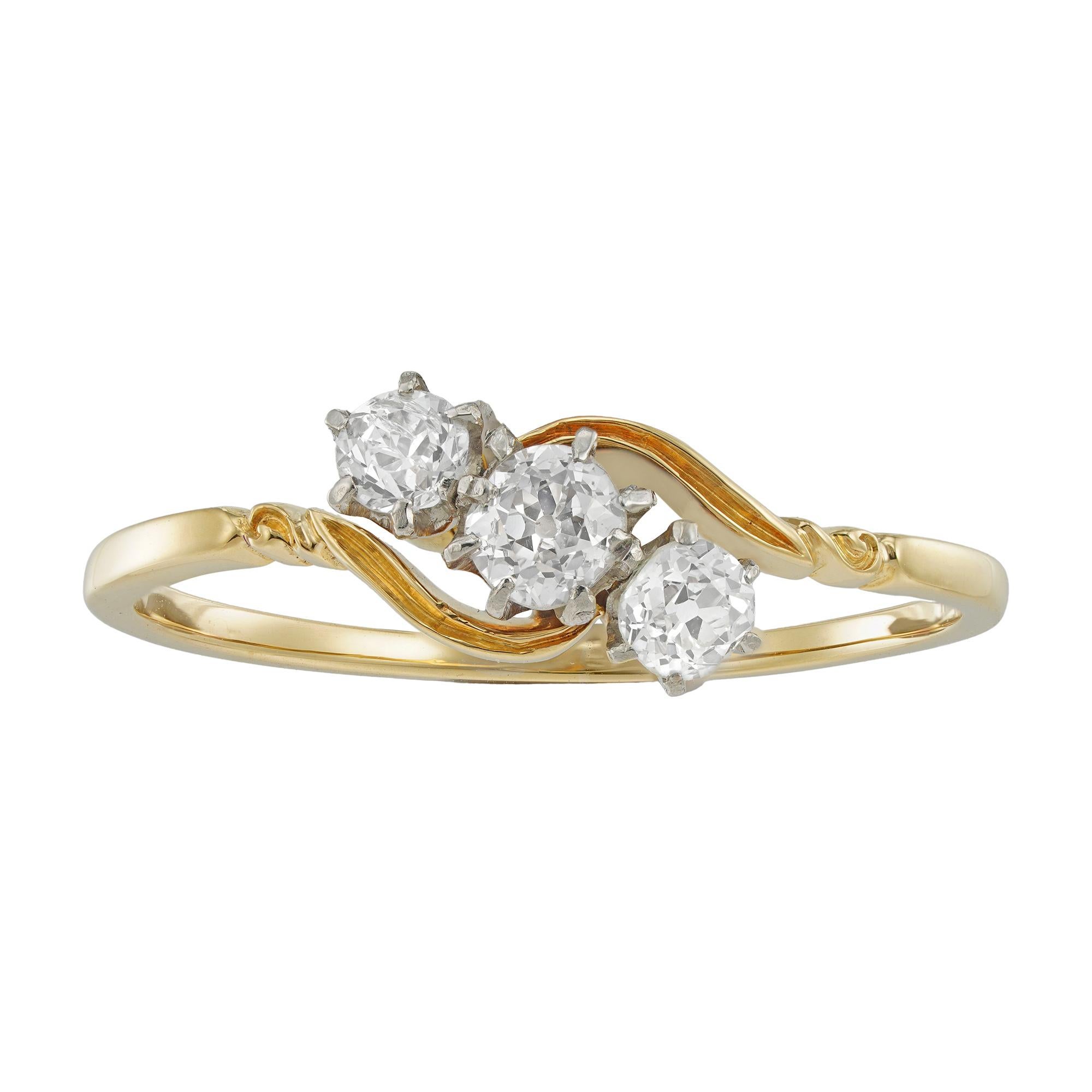 Old European Cut An Edwardian three-stone diamond ring For Sale