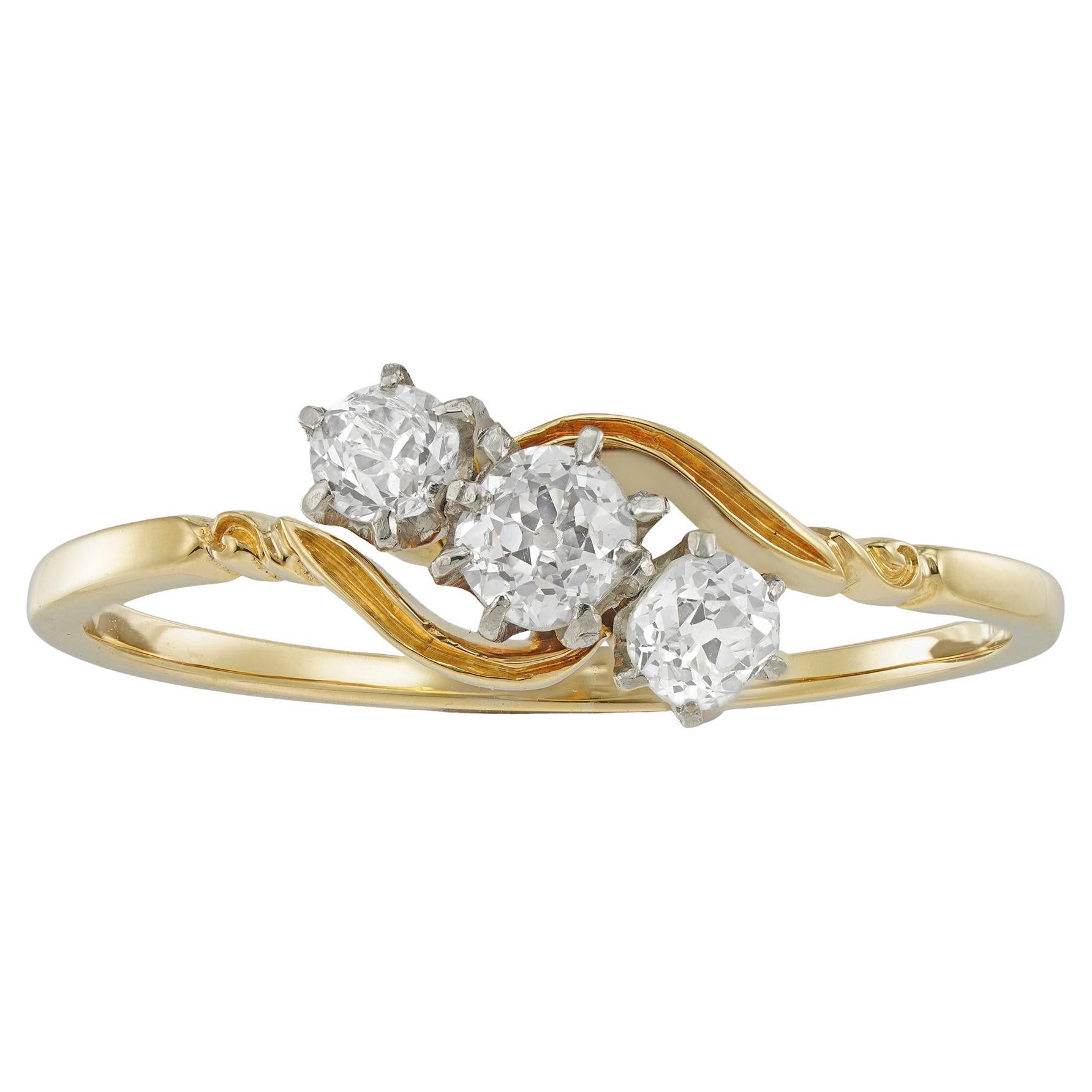 An Edwardian three-stone diamond ring For Sale