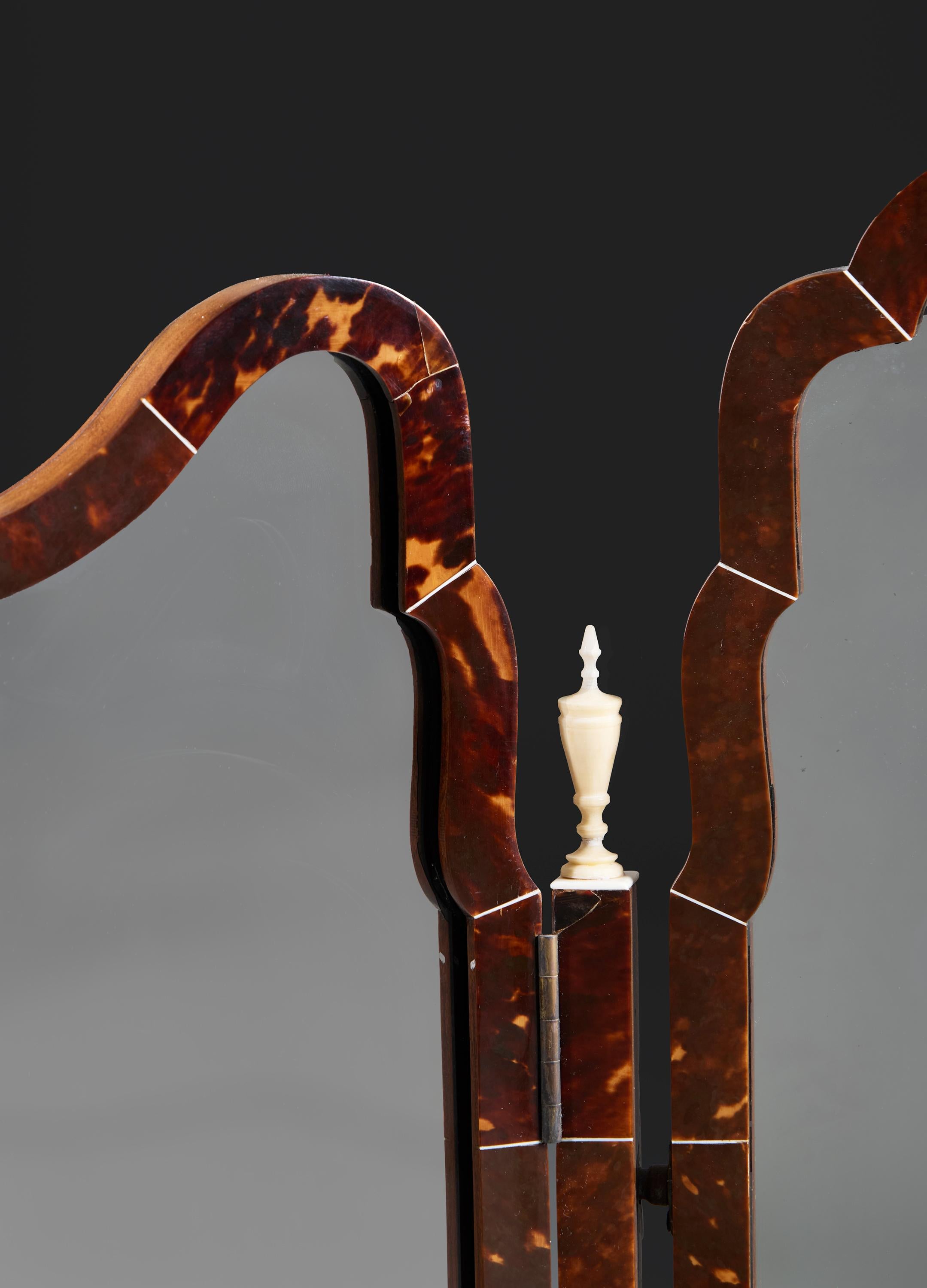 English An Edwardian Tortoiseshell and Ivorine Dressing Table Mirror For Sale