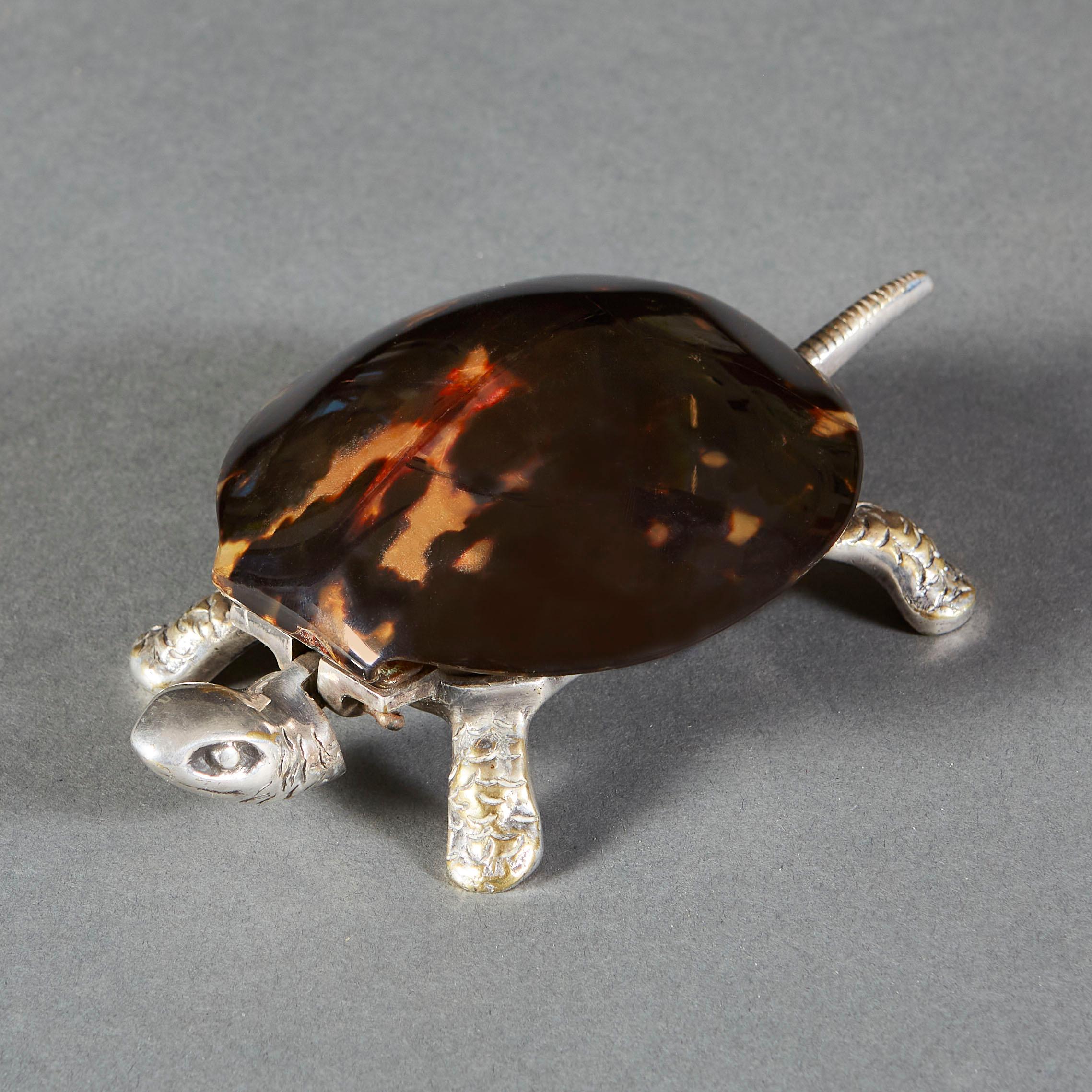 An unusual Edwardian silver plated tortoise bell, with polished tortoise shell.