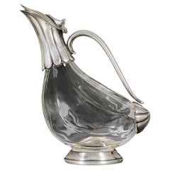 Decantador zoomorfo eduardiano de plata y cristal con forma de pato