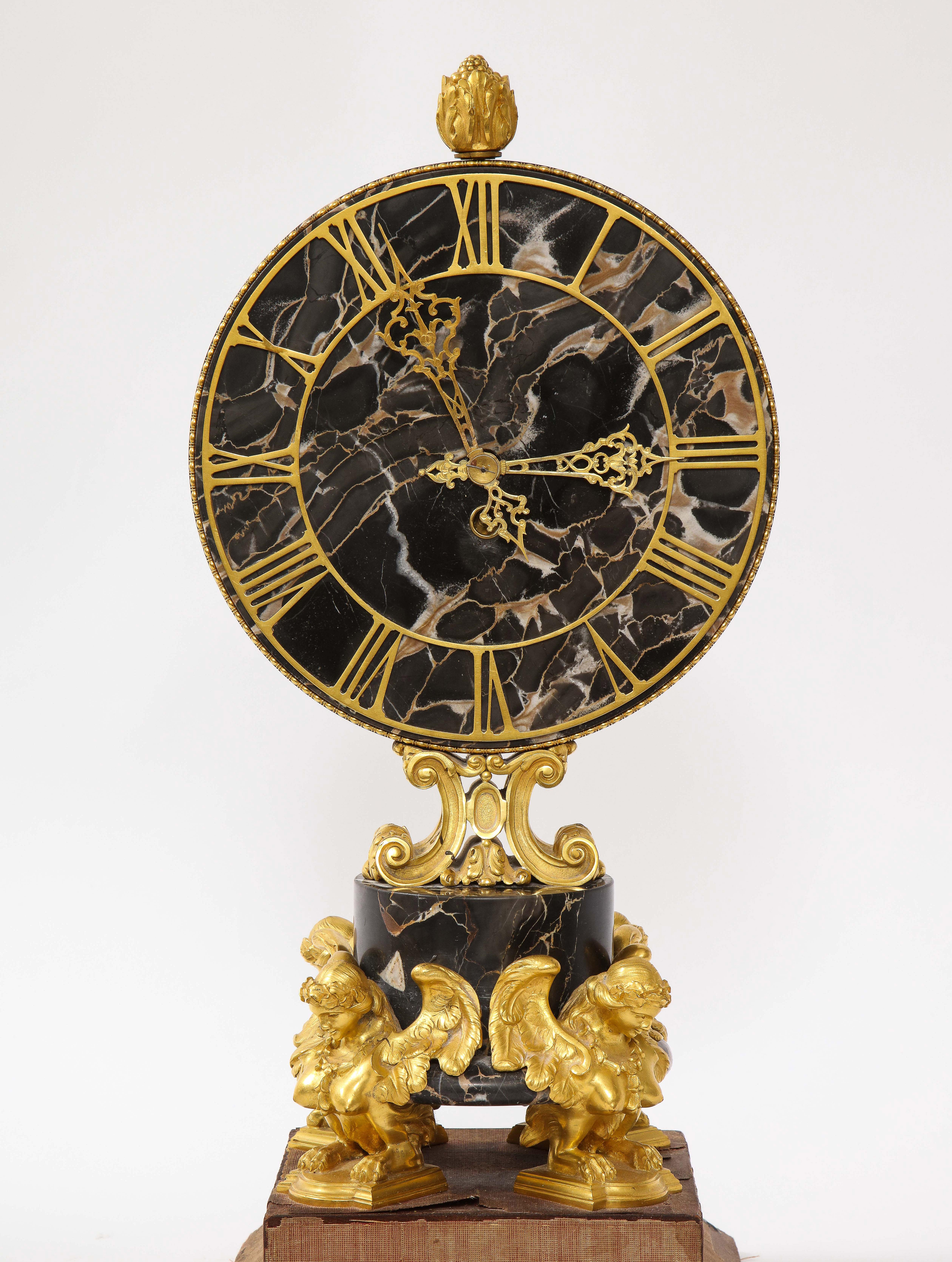 Louis XVI E.F. Caldwell Veined Black Marble and Dore Bronze Mounted Sphinx Legged Clock For Sale