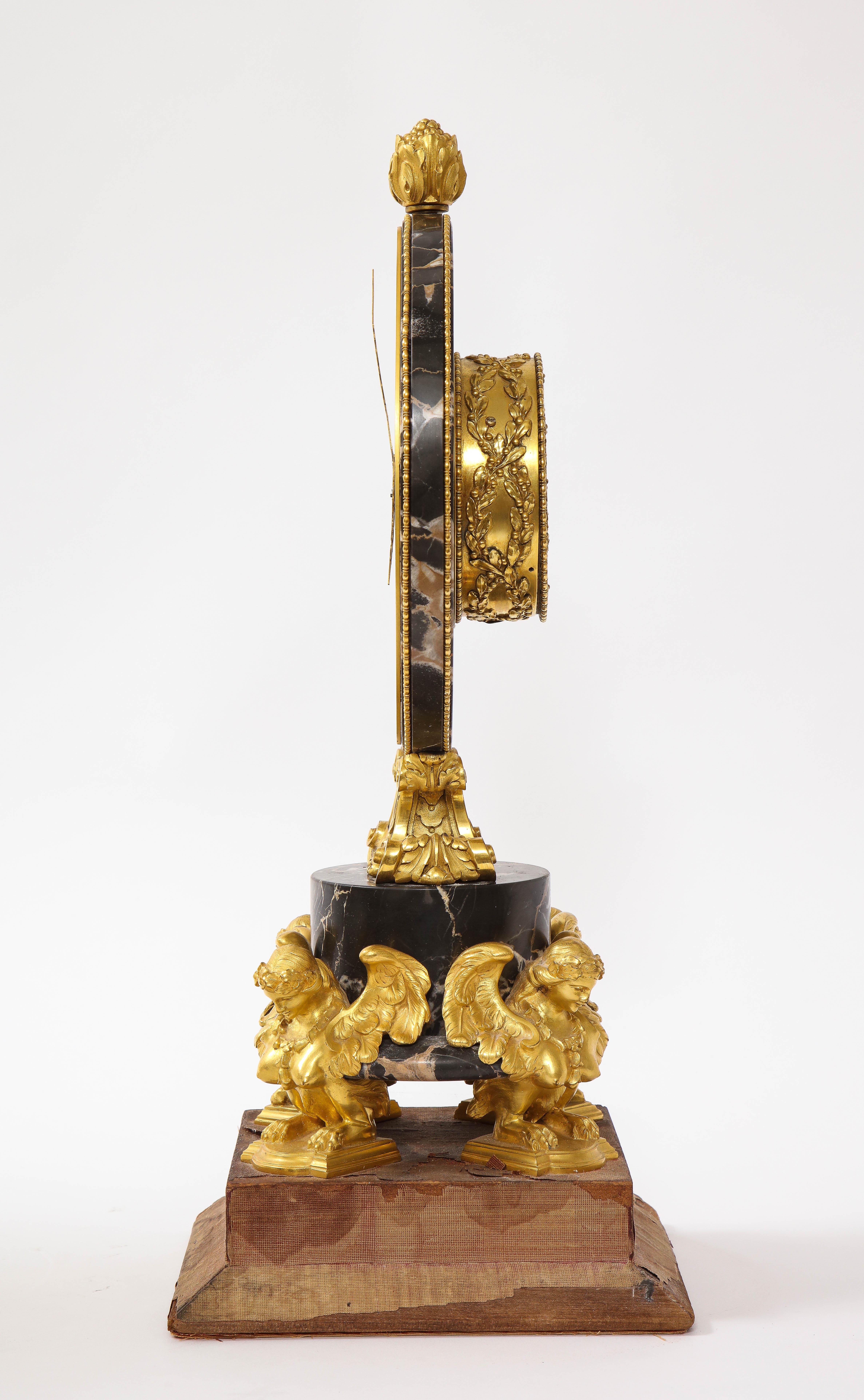 E.F. Caldwell Veined Black Marble and Dore Bronze Mounted Sphinx Legged Clock In Good Condition For Sale In New York, NY