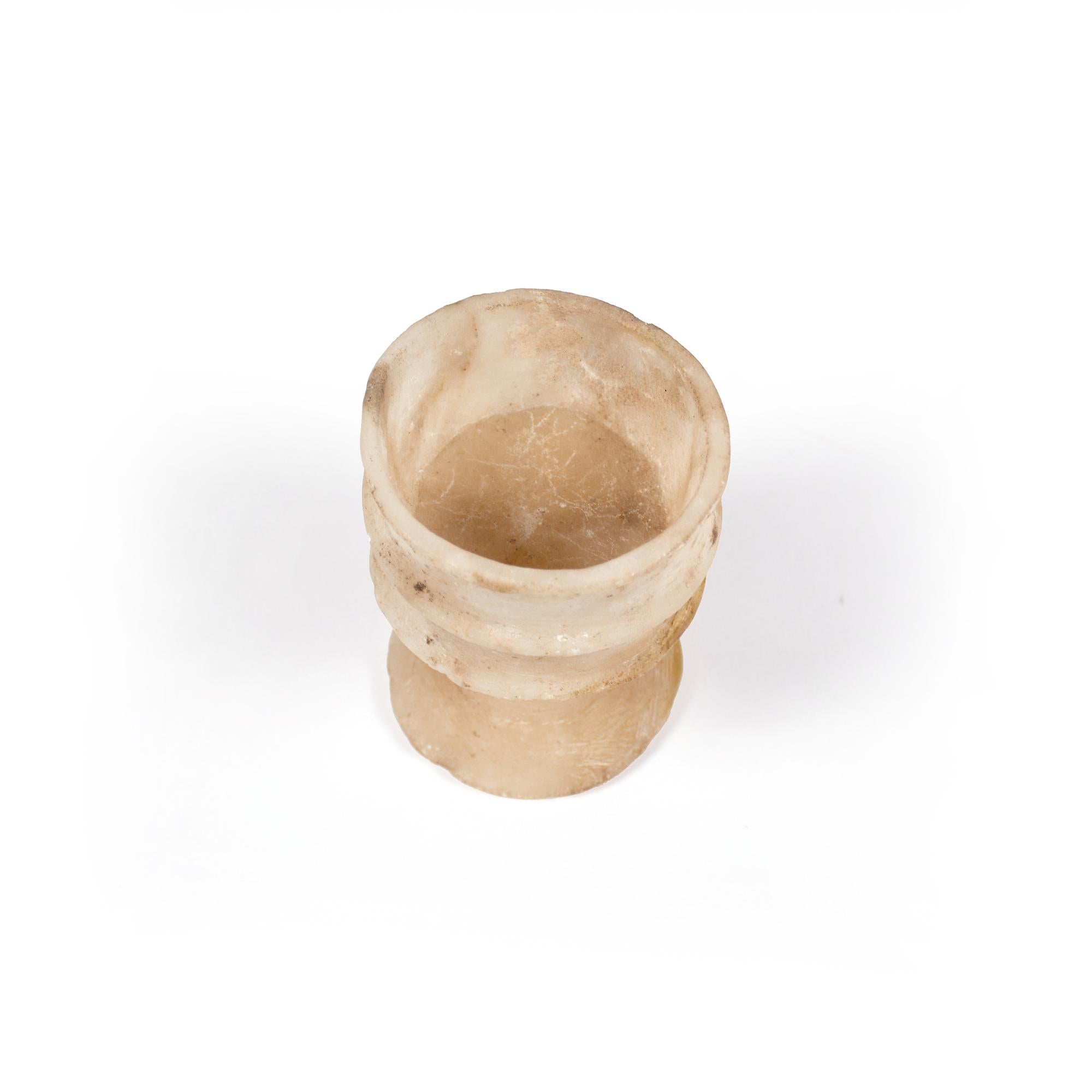 18th Century and Earlier An Egyptian alabaster ribbed cup, New Kingdom, 18th dynasty For Sale