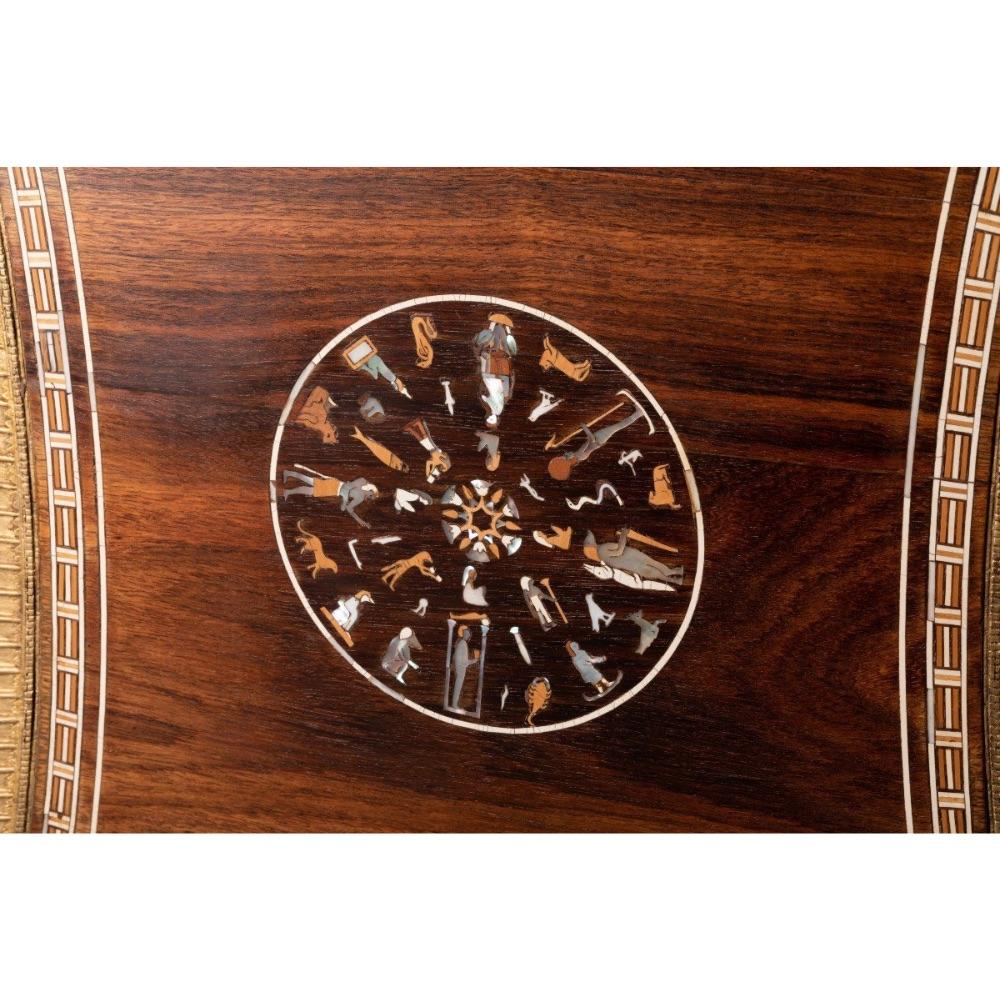 20th Century An Egyptian Revival Simulated  Bone Inlaid Parcel Gilt Mahogany Side Table For Sale