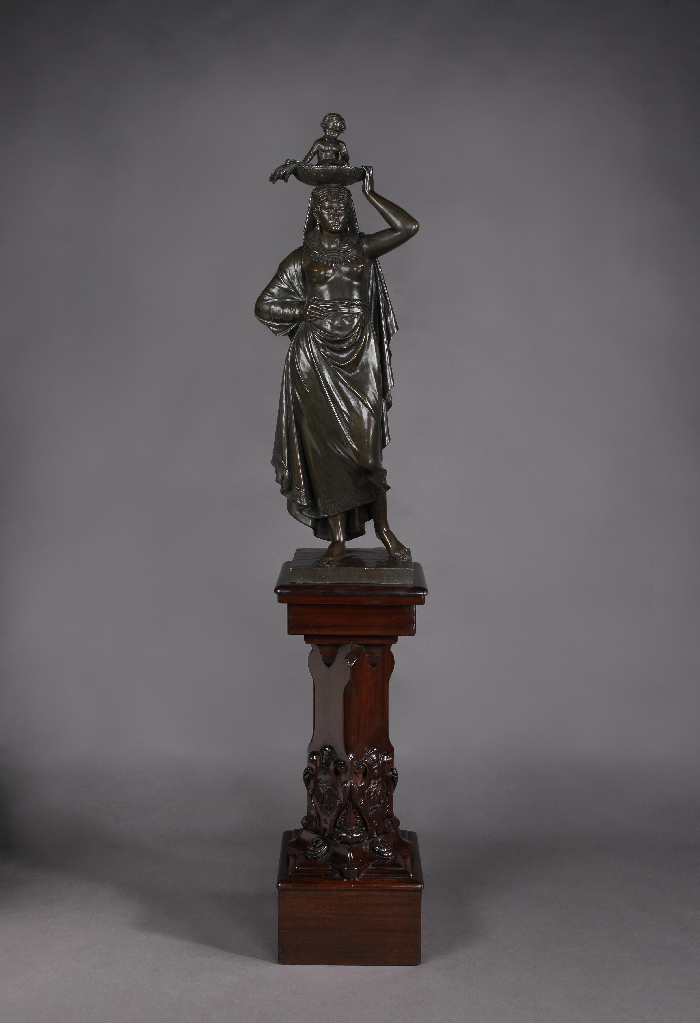 'Moses and Jochebed  - A Fine Patinated Bronze Figural Group After A Model by 'François Truphème', Cast by 'Thiebaut Frères'.

Signed 'Fois Truphème 1863' and 'fdu par Vor Thiebaut'. 

This impressive patinated bronze figure is raised on a carved