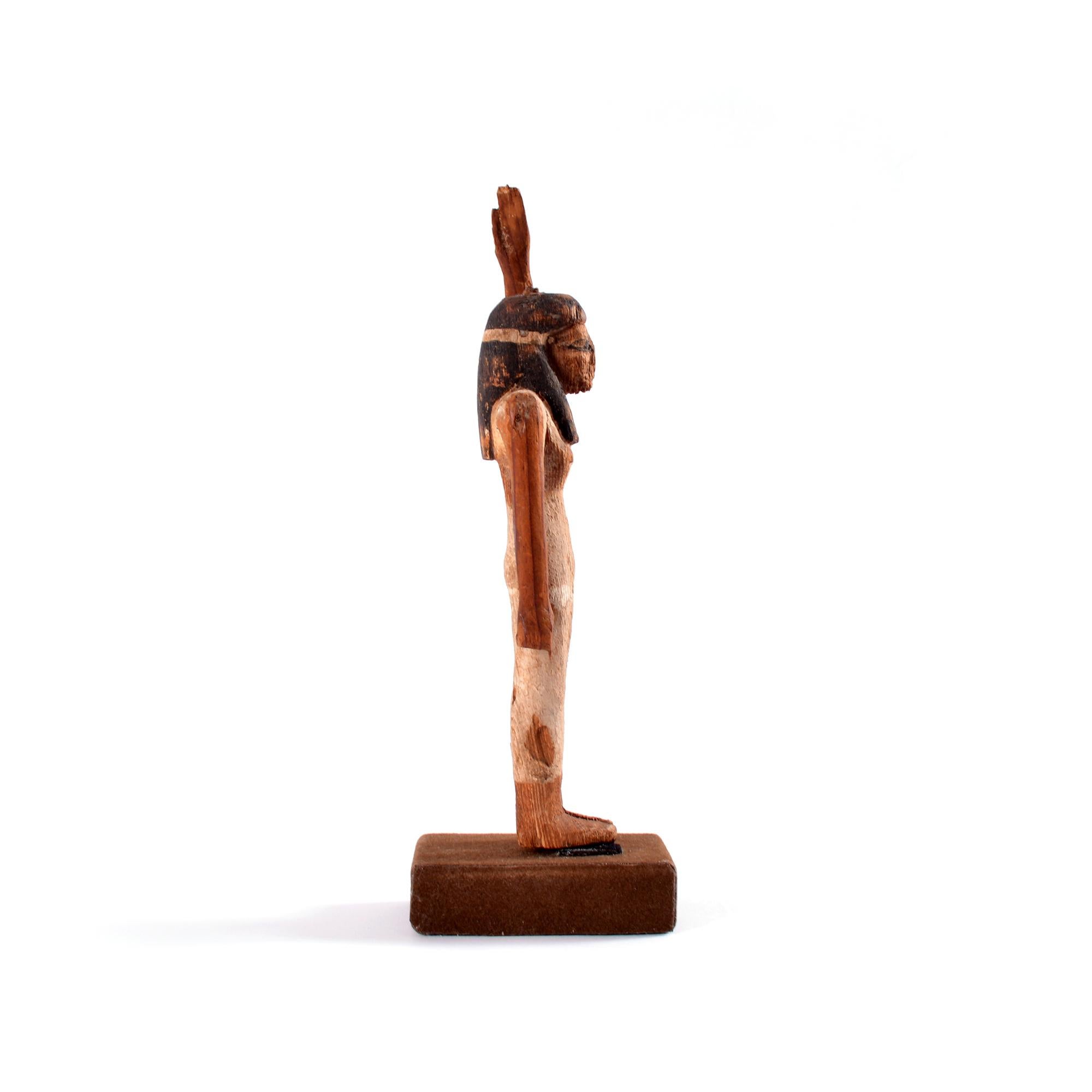 An Egyptian wooden female offering bearer figure, Middle Kingdom In Fair Condition For Sale In UTRECHT, UT
