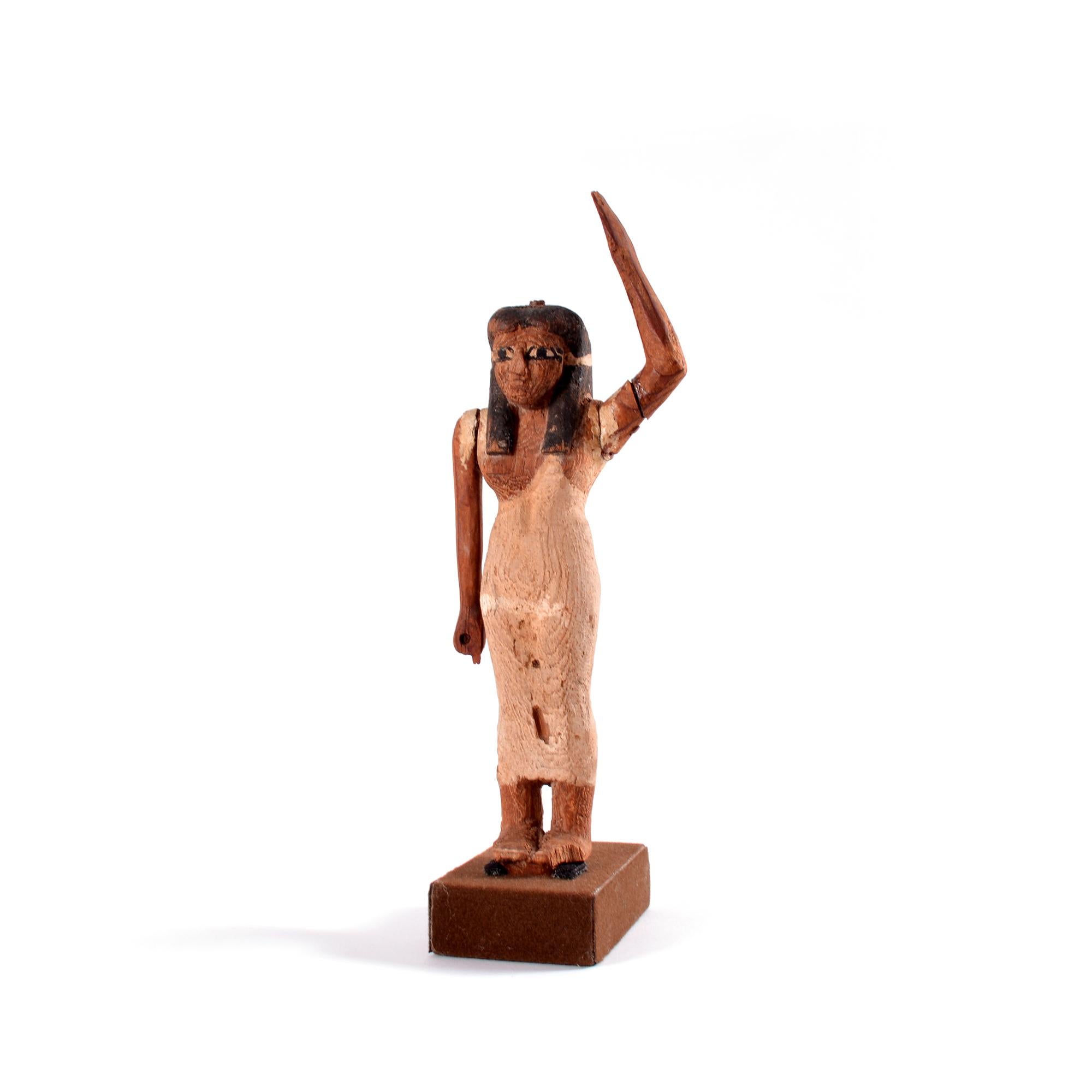 An Egyptian wooden female offering bearer figure, Middle Kingdom For Sale 4