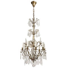 Eight Arm Brass and Glass Chandelier with Four Tiers of Faceted Crystal Prisms
