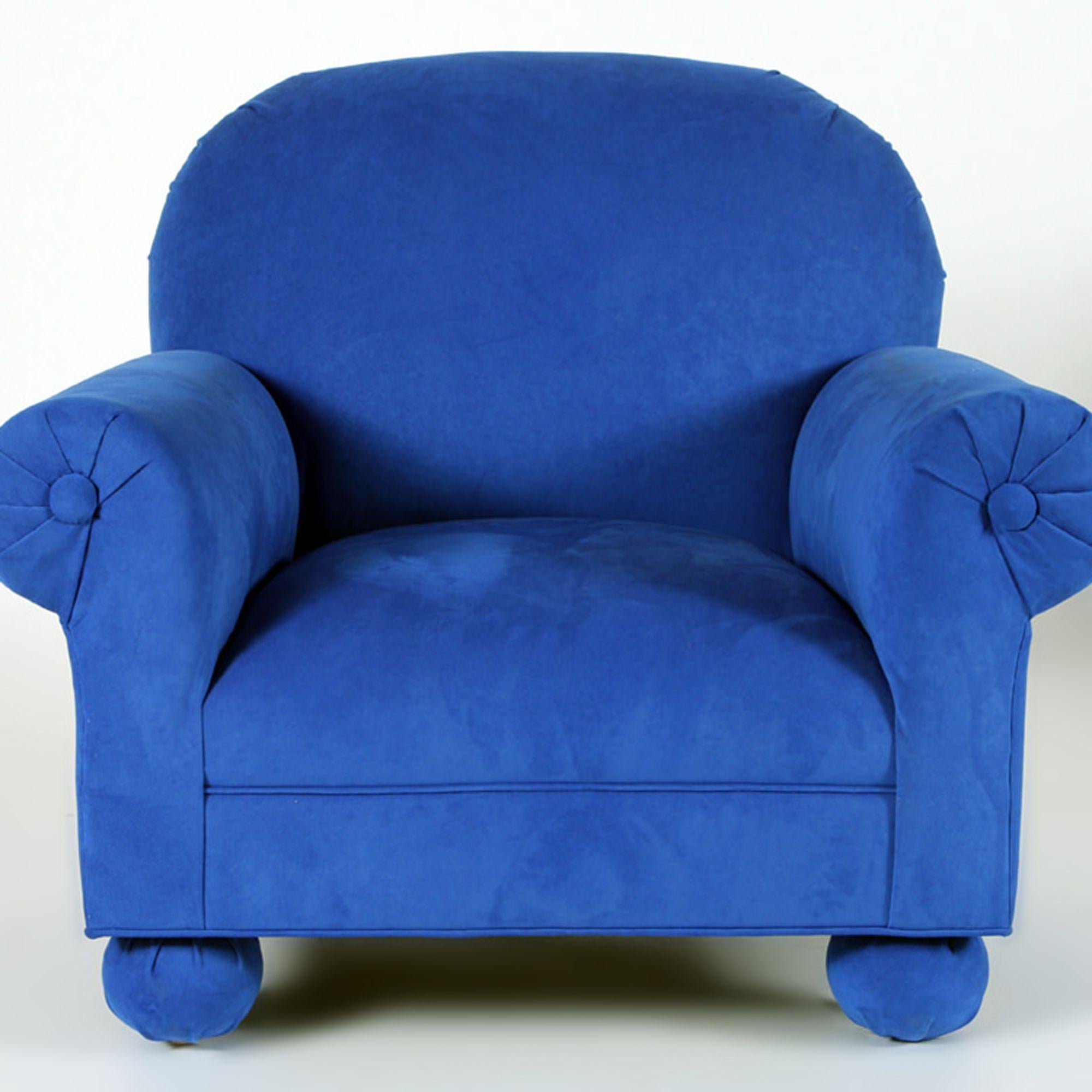 An electric blue upholstered custom made roll arm club chair. circa 1995.