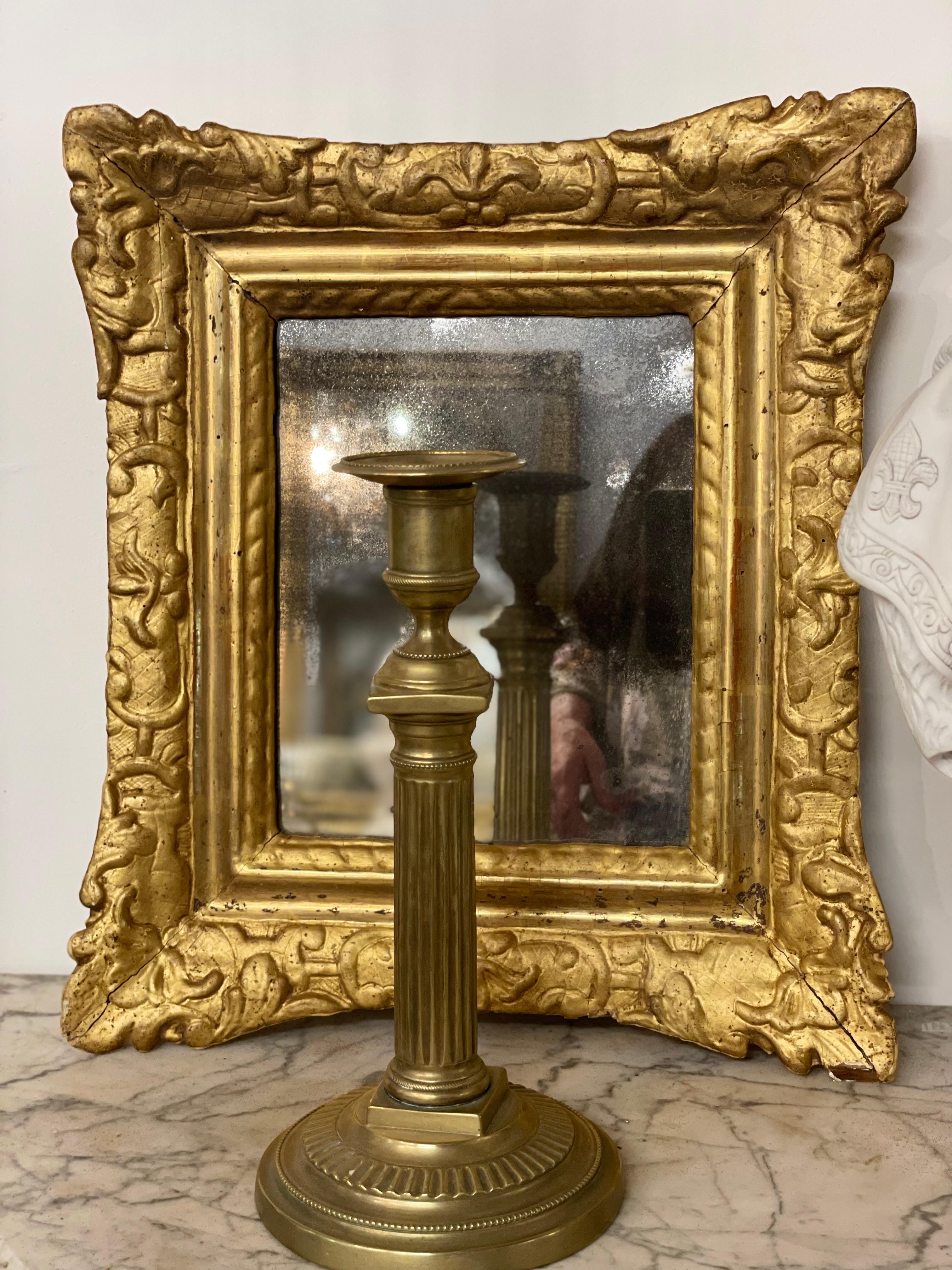 Louis XVI 18th Century Giltwood Wall Mirror, with An Ornate Flared-Cornered  For Sale